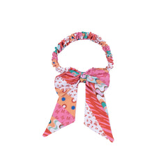 Girl summer pinkish bandana with a bow