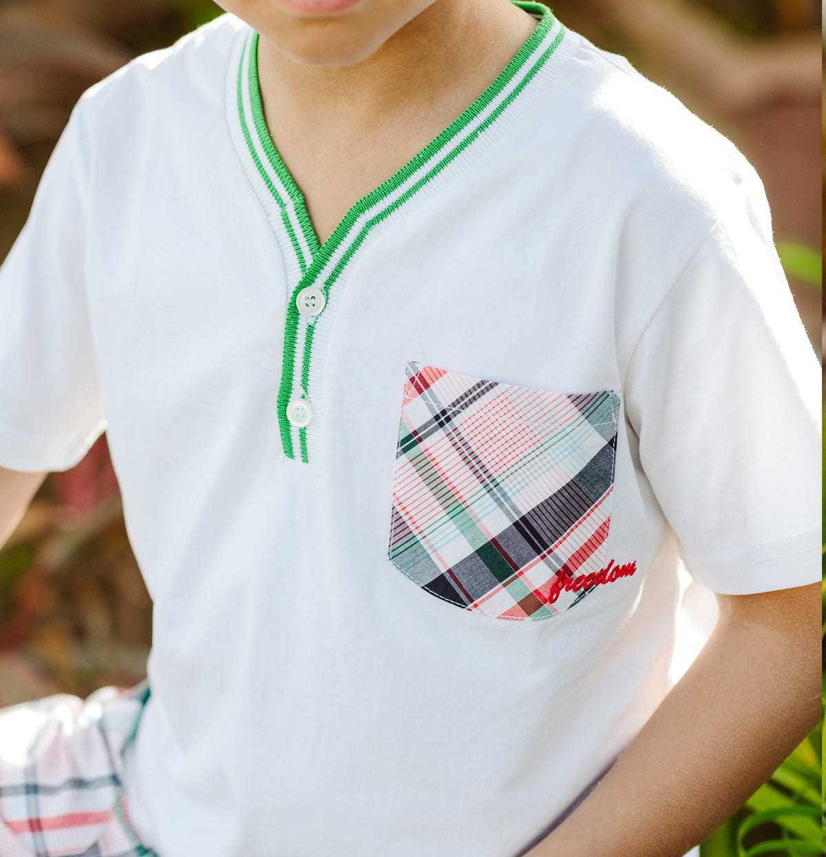 Stylish white tshirt with checked pocket for boys by Pompelo